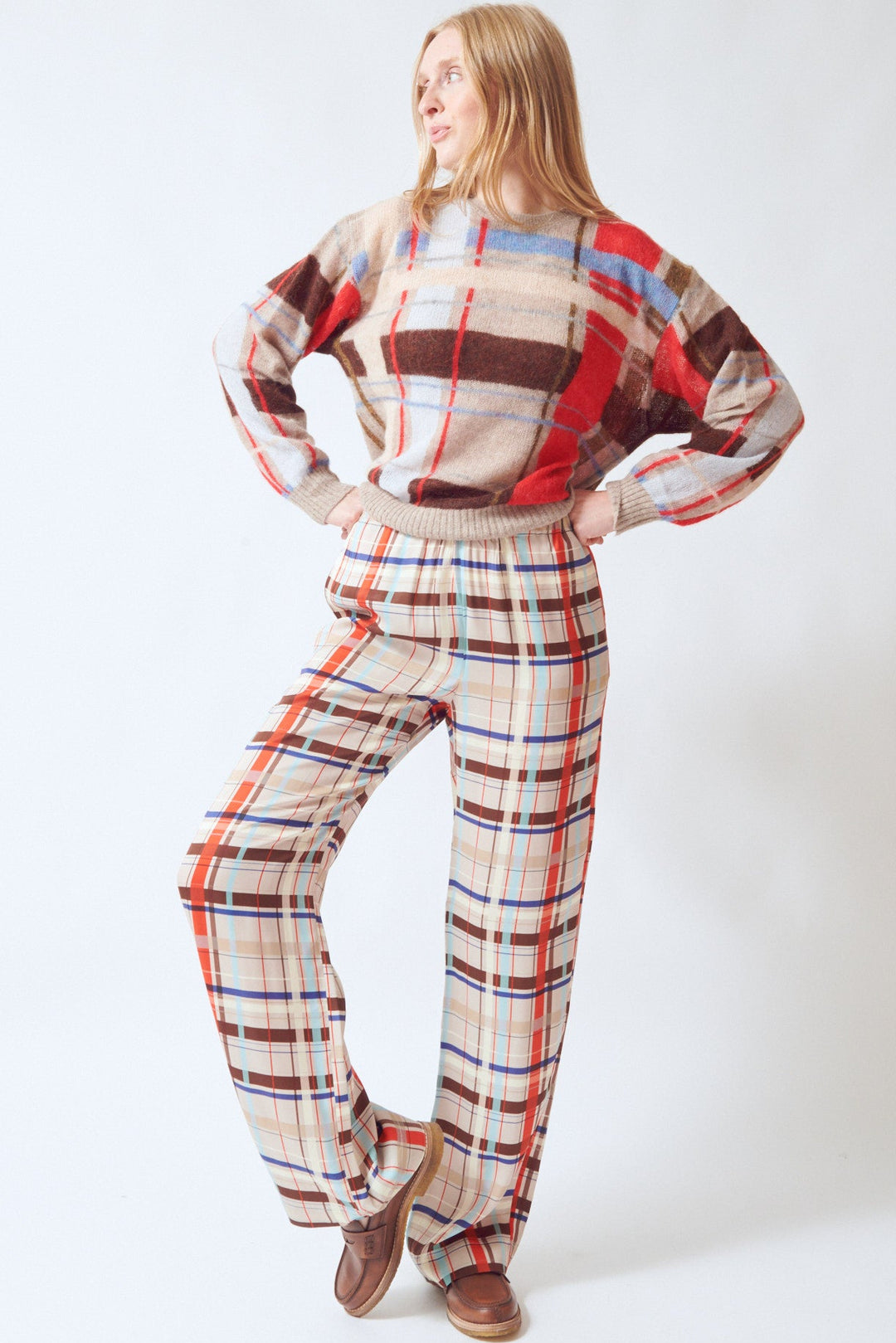 Madi wearing Stine Goya Dry Viscose Elasticated Long Pants Scarlet Grid front view