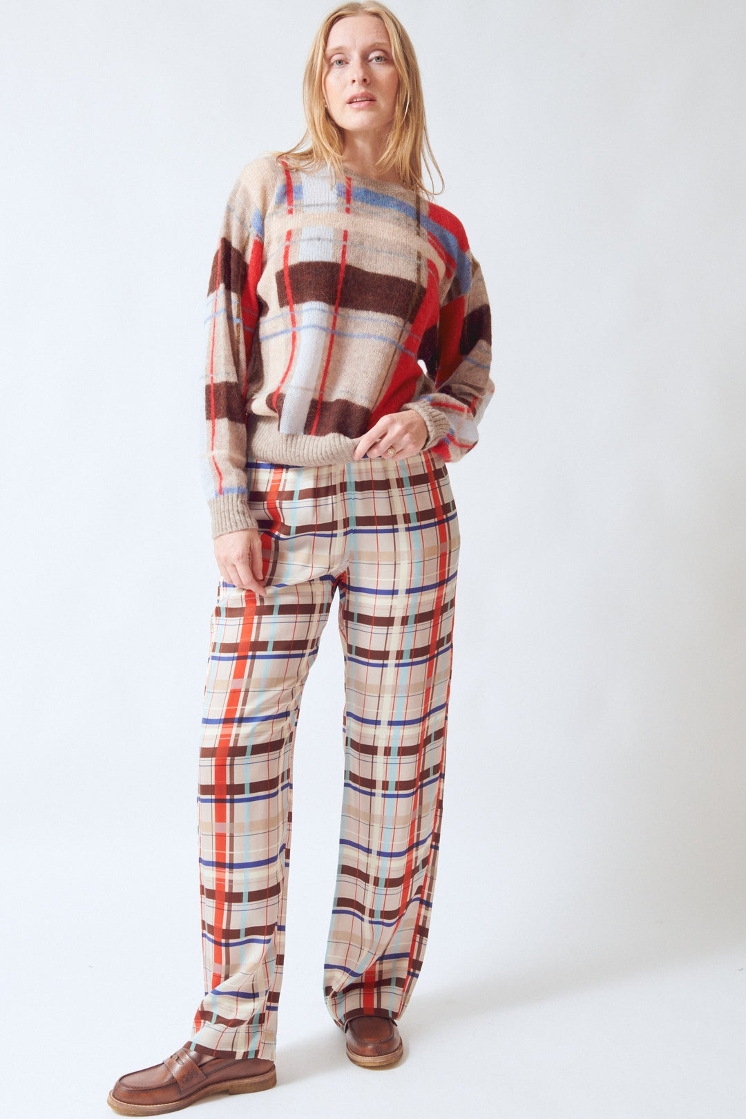 Madi wearing Stine Goya Dry Viscose Elasticated Long Pants Scarlet Grid front view
