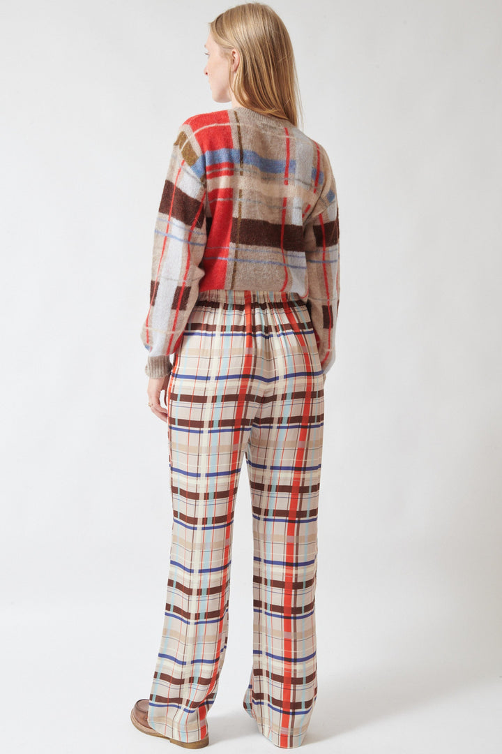 Madi wearing Stine Goya Dry Viscose Elasticated Long Pants Scarlet Grid rear view