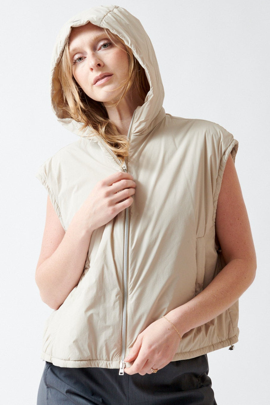 Madi wearing Herno Light Nylon Stretch Hooded Blouson Vest front/hood view