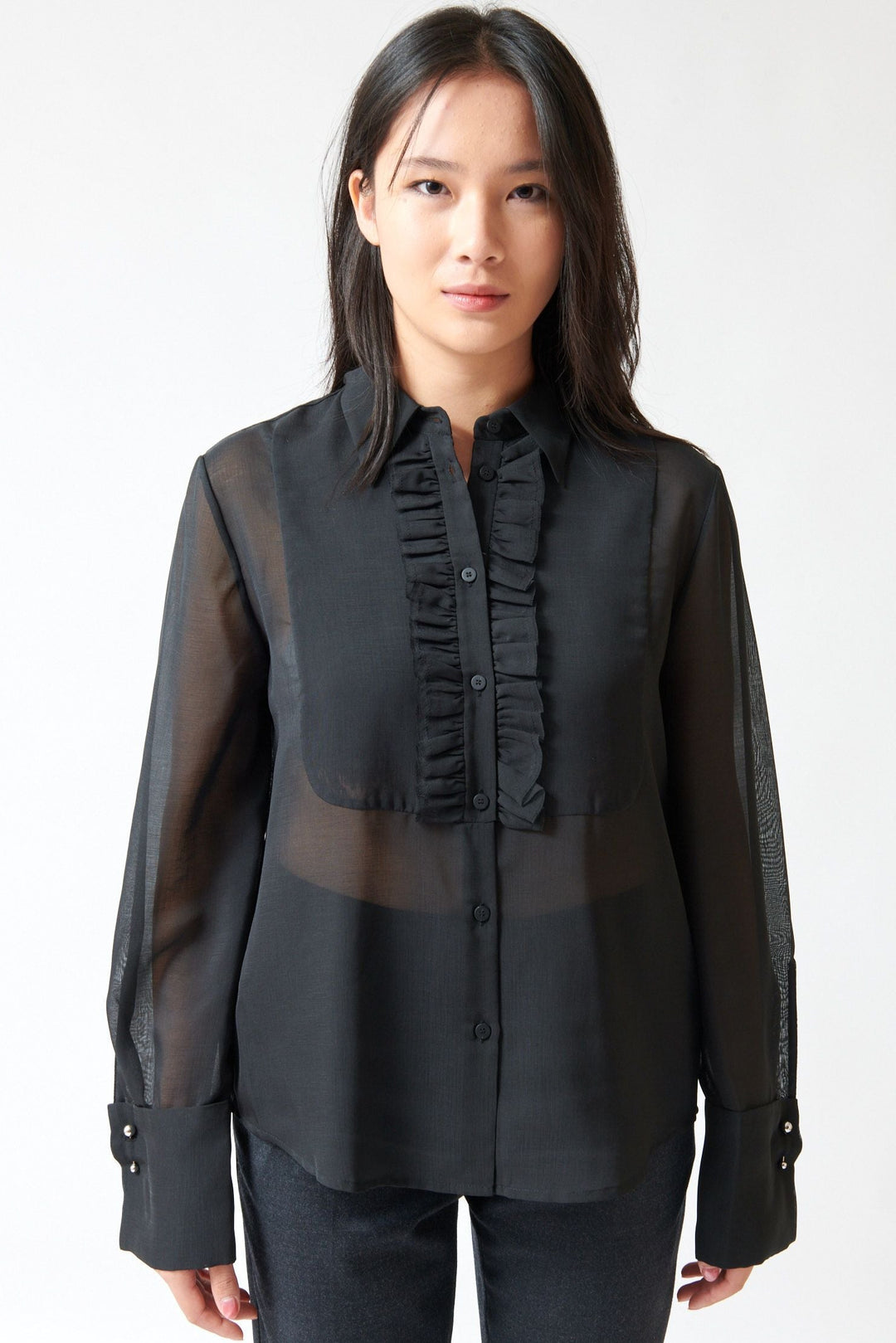 Lilly wearing Tela Opal Shirt front view