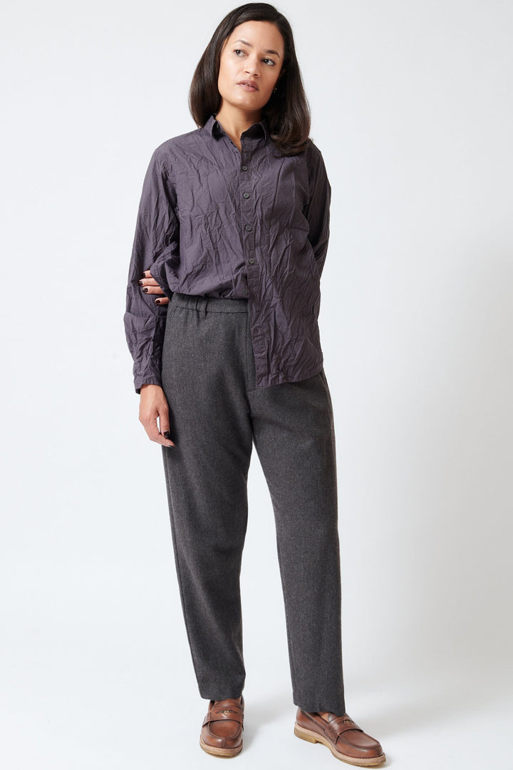 Model wearing Pas de Calais Eco Wool Premium Tweed Full Length Tapered Pants Front view