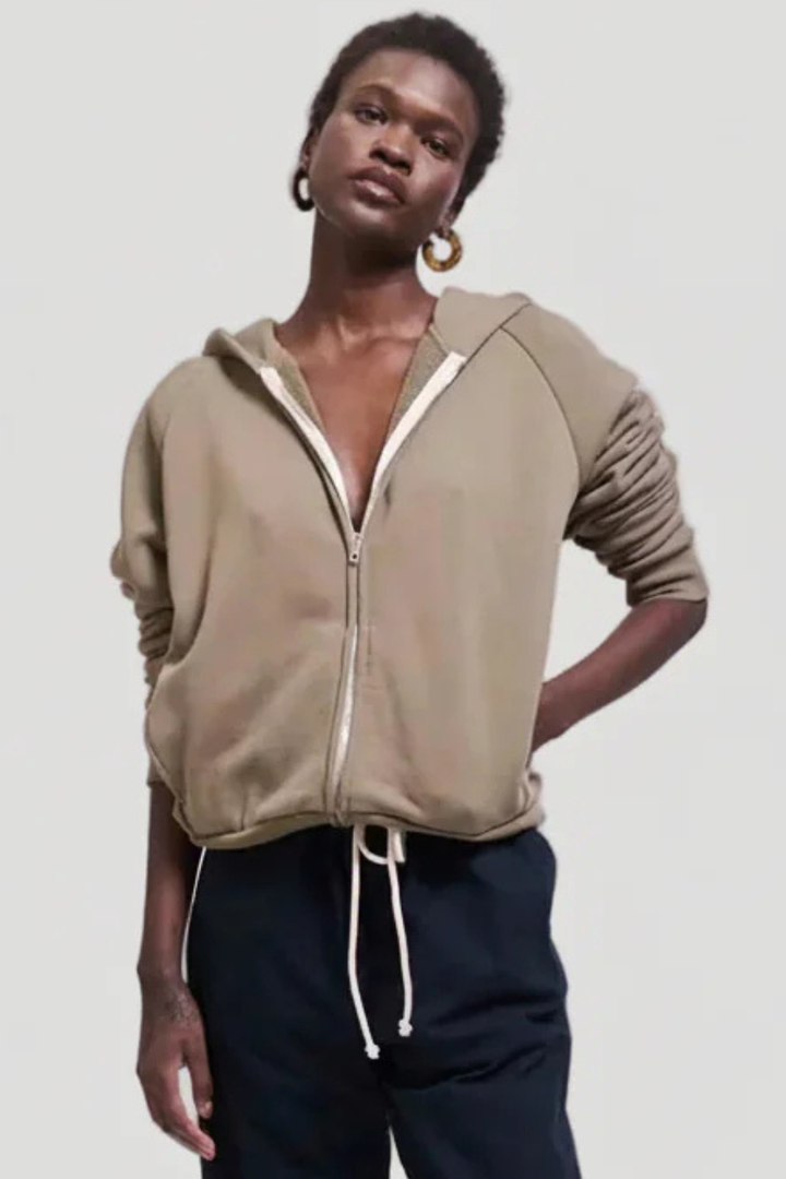 Model wearing Jamie Haller The Bird Hoodie in Loden front view