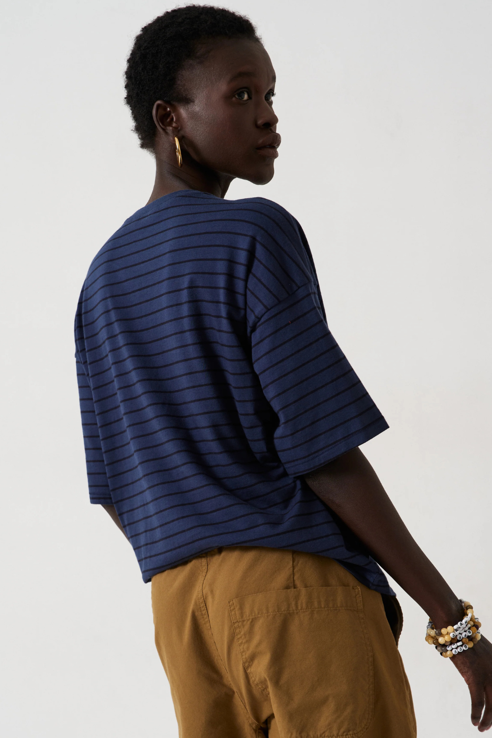 Model wearing Jamie Haller The Boxy Tee in Blue Stripe rear view