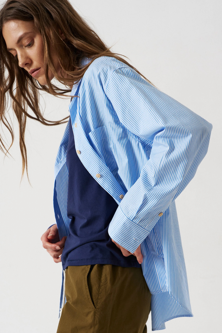 Model wearing Jamie Haller The Weekend Shirt in Teal Stripe side view