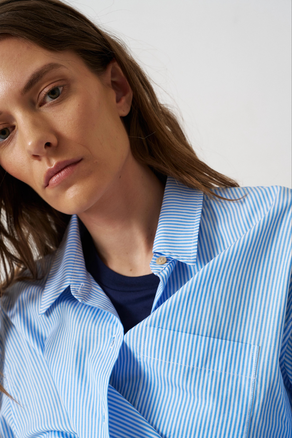 Model wearing Jamie Haller The Weekend Shirt in Teal Stripe detail view