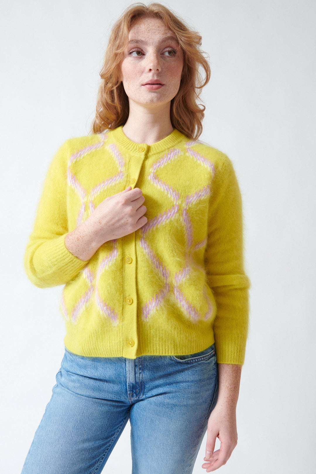 Waverly wearing Jumper 1234 Cashmere Graphic Argyle Cardigan front view