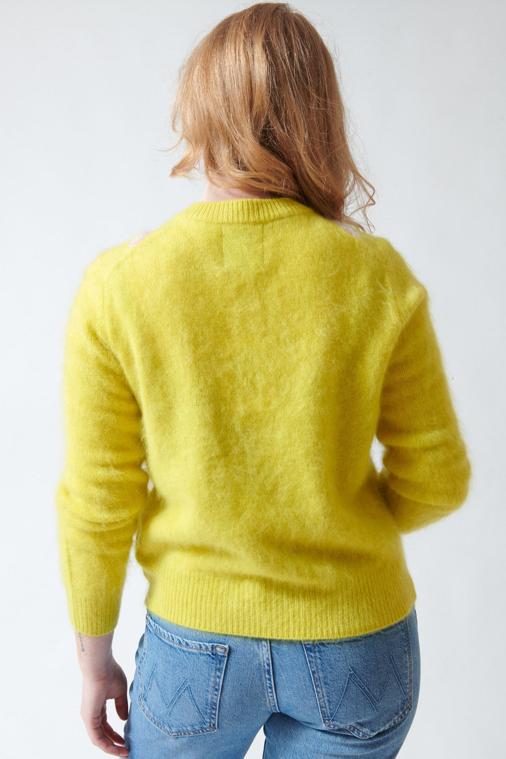 Waverly wearing Jumper 1234 Cashmere Graphic Argyle Cardigan rear view
