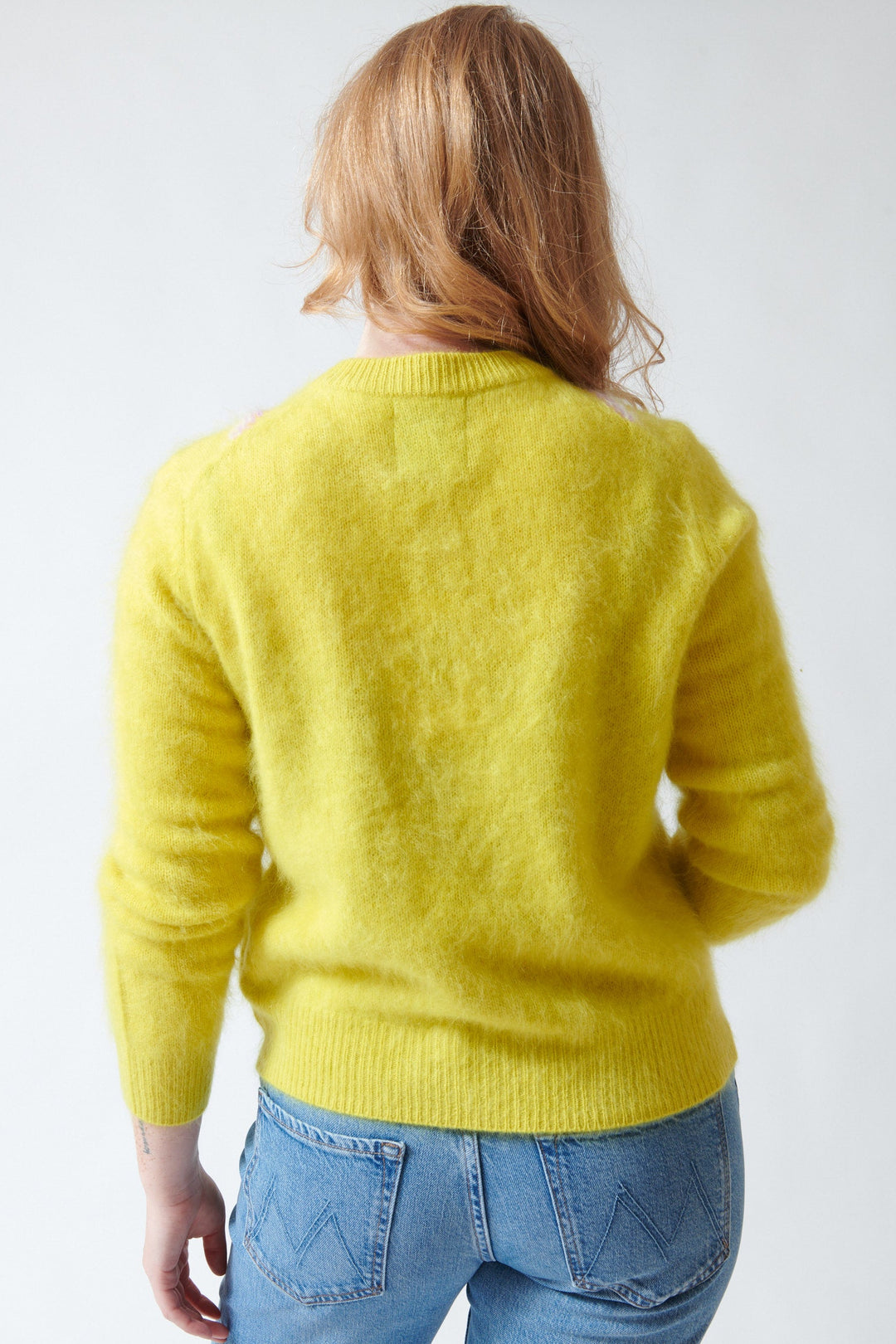 Waverly wearing Jumper 1234 Cashmere Graphic Argyle Cardigan rear view