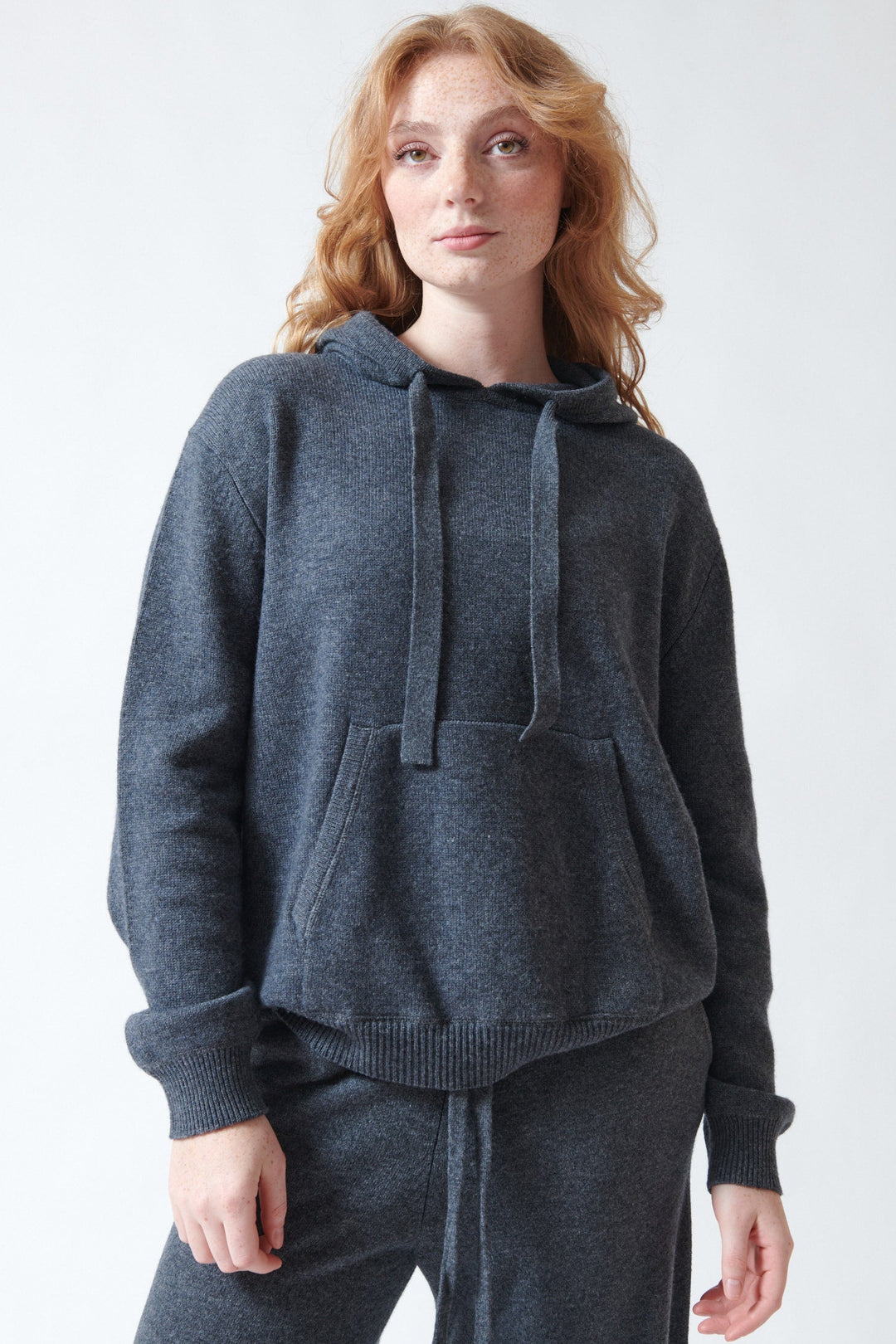 Waverly wearing Jumper 1234 Merino Hoodie front view
