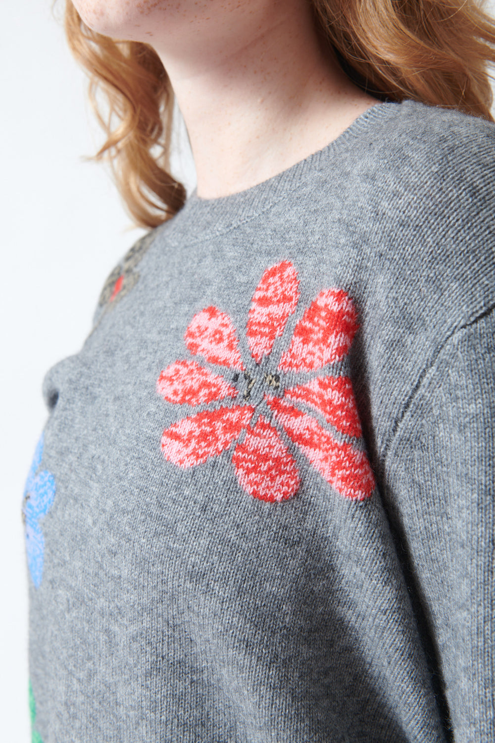 Waverly wearing Jumper 1234 Twisted Floral Crew Sweater detail view
