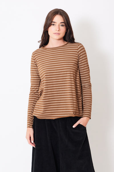 Front view of model wearing light/dark brown striped long sleeve tee shirt