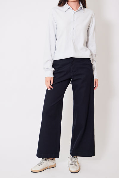 Front view of model wearing navy blue cotton trouser pant