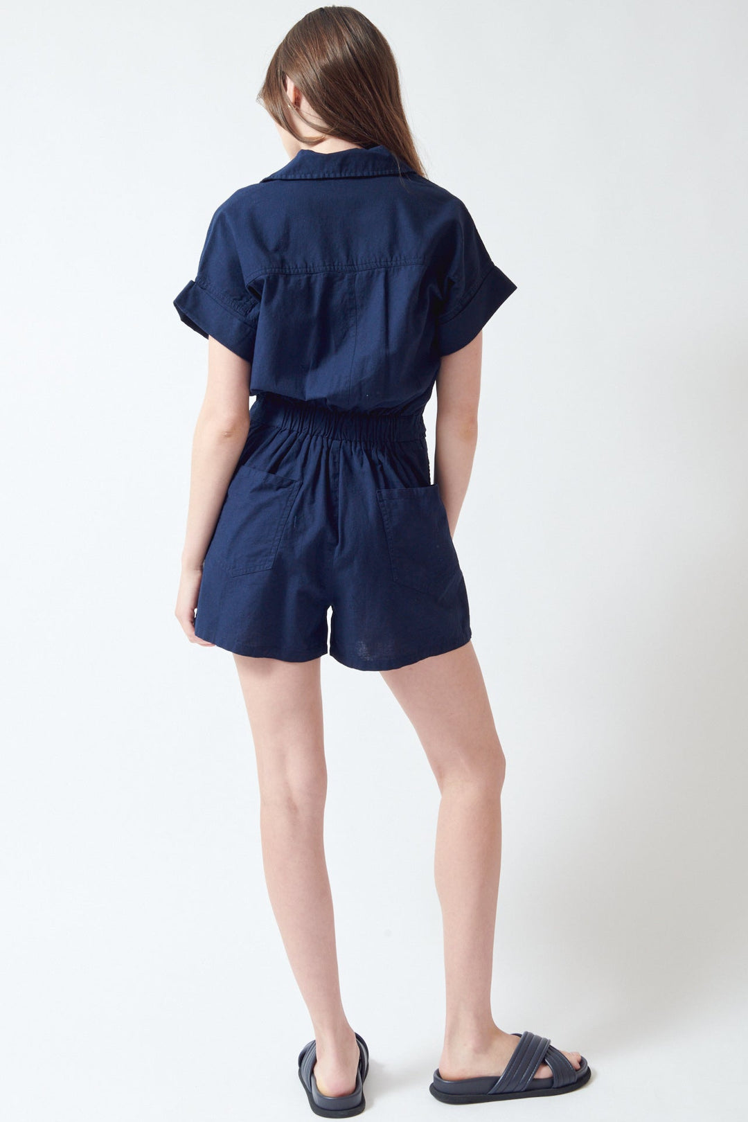 Angela wearing Lilla P Linen Blend Romper Navy rear view