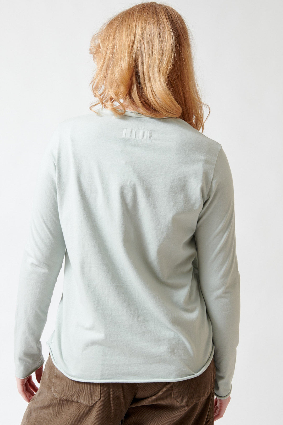 Waverly wearing Labo.Art Agapi Long Sleeve Tee rear view