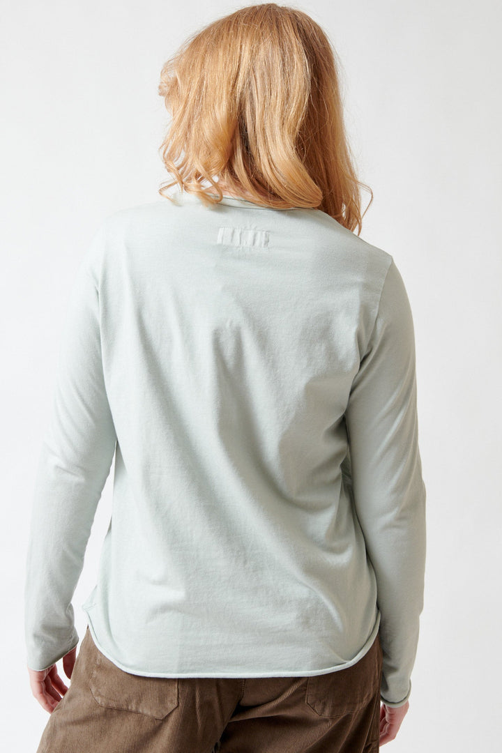 Waverly wearing Labo.Art Agapi Long Sleeve Tee rear view