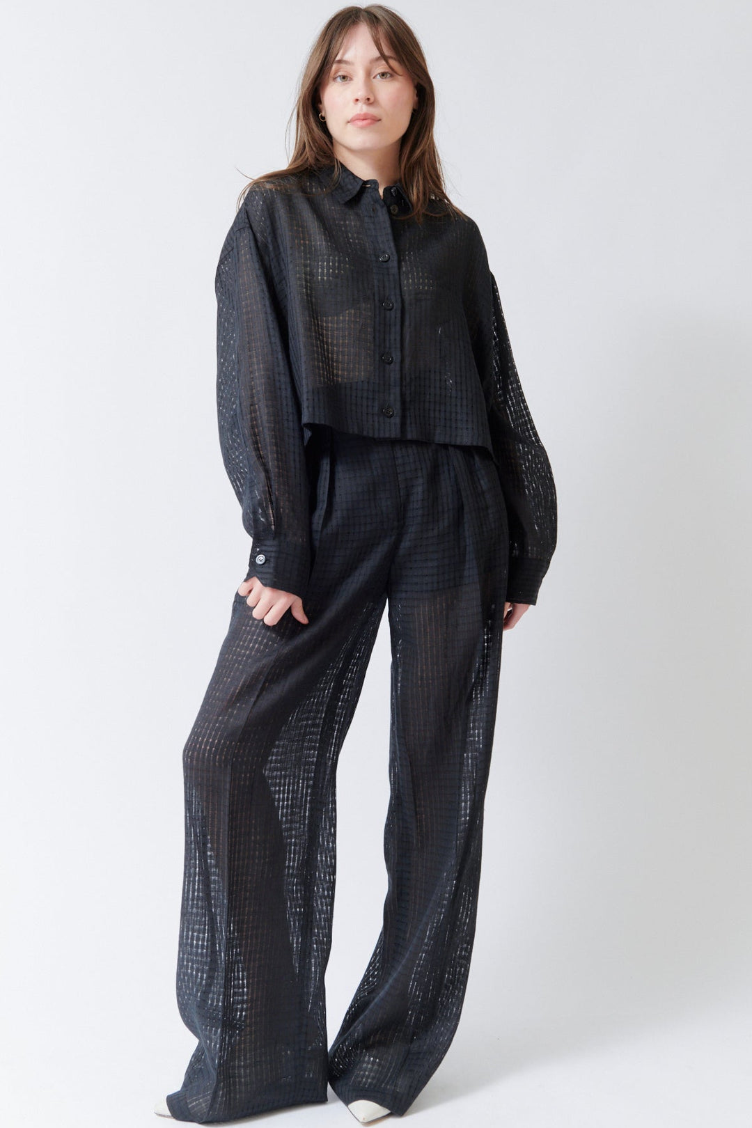 Angela wearing Mantu Lanisha Pleated Trousers front view