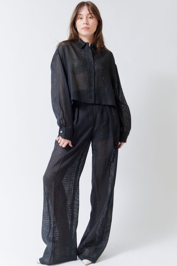 Angela wearing Mantu Lanisha Pleated Trousers front view