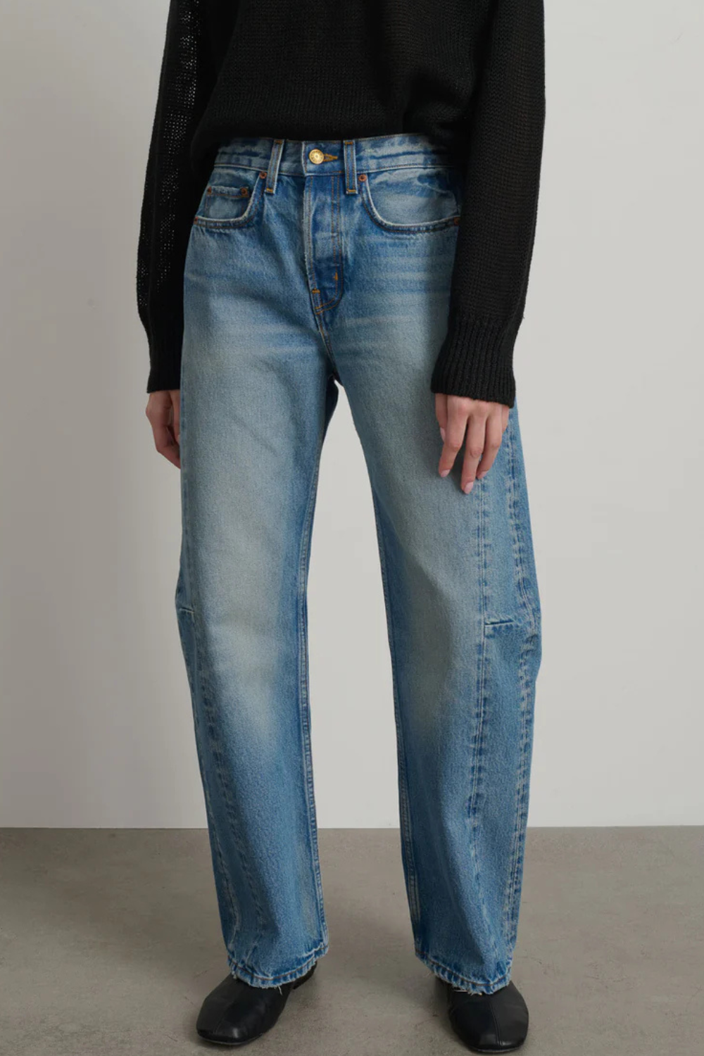 Model wearing B SIDES Slim Lasso front view