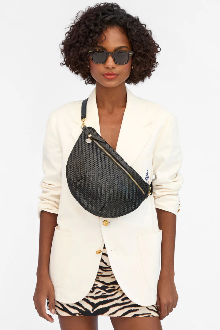 Model wearing Clare V. Grande Fanny Black Woven Zig Zag front view