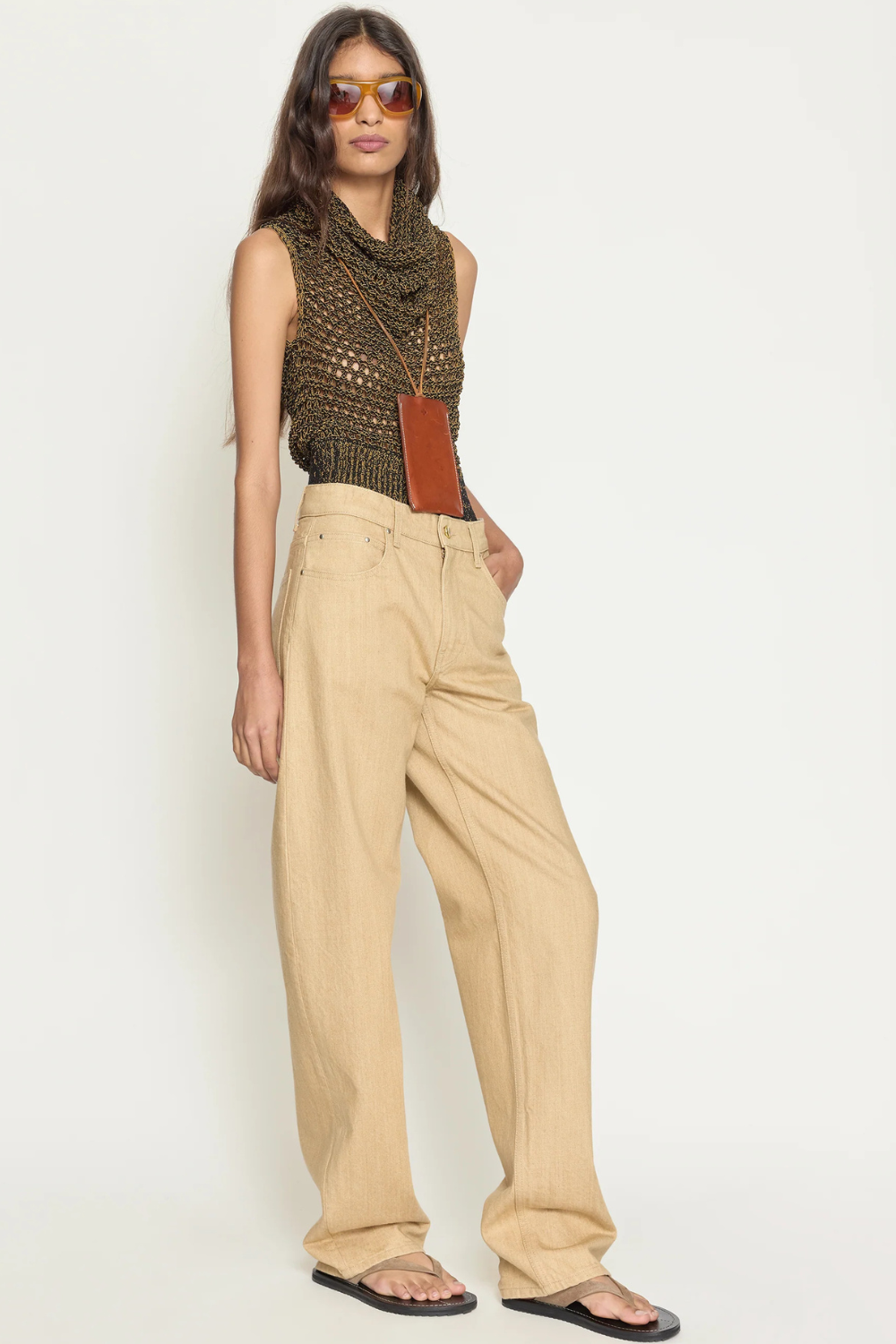 Model wearing OSSOU Rider Jean Clay Wash front/side view