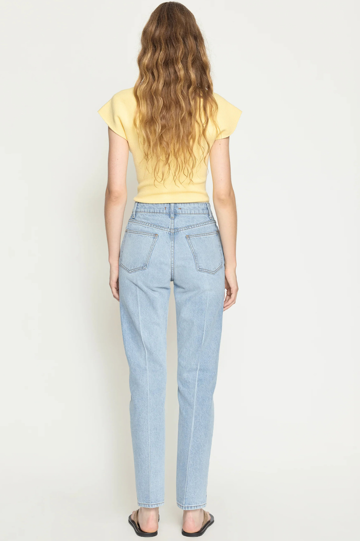 Model wearing OSSOU Noon Jean Salt W Crease rear view
