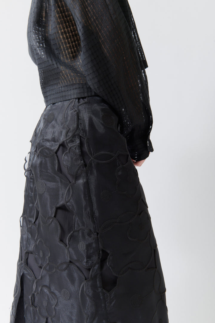 Angela wearing Meimeij Floral Cut Out Overlay Skirt Black rear/detail view
