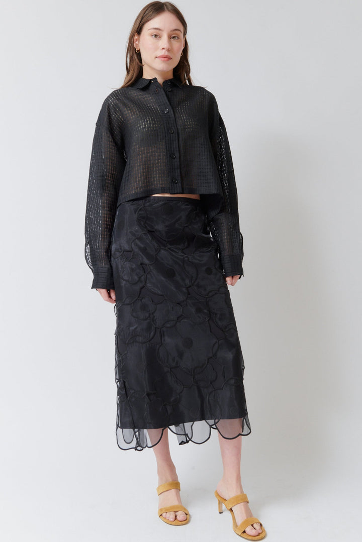 Angela wearing Meimeij Floral Cut Out Overlay Skirt Black front view