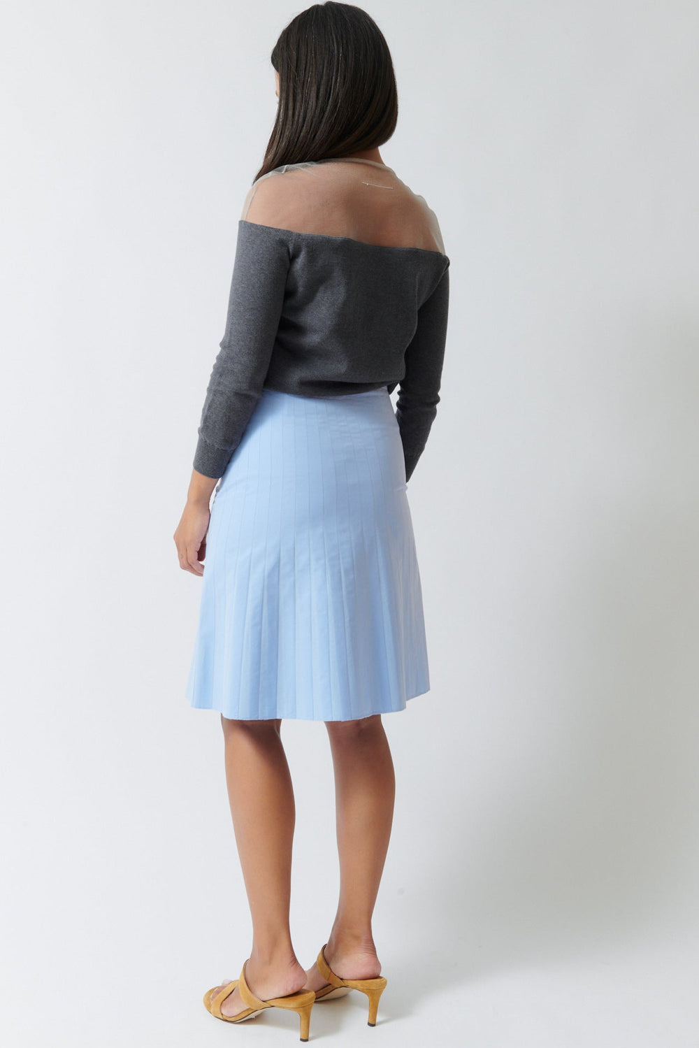 Amanda wearing MM6 Maison Margiela Fused Light Cotton Poplin Pleat Look Skirt rear view