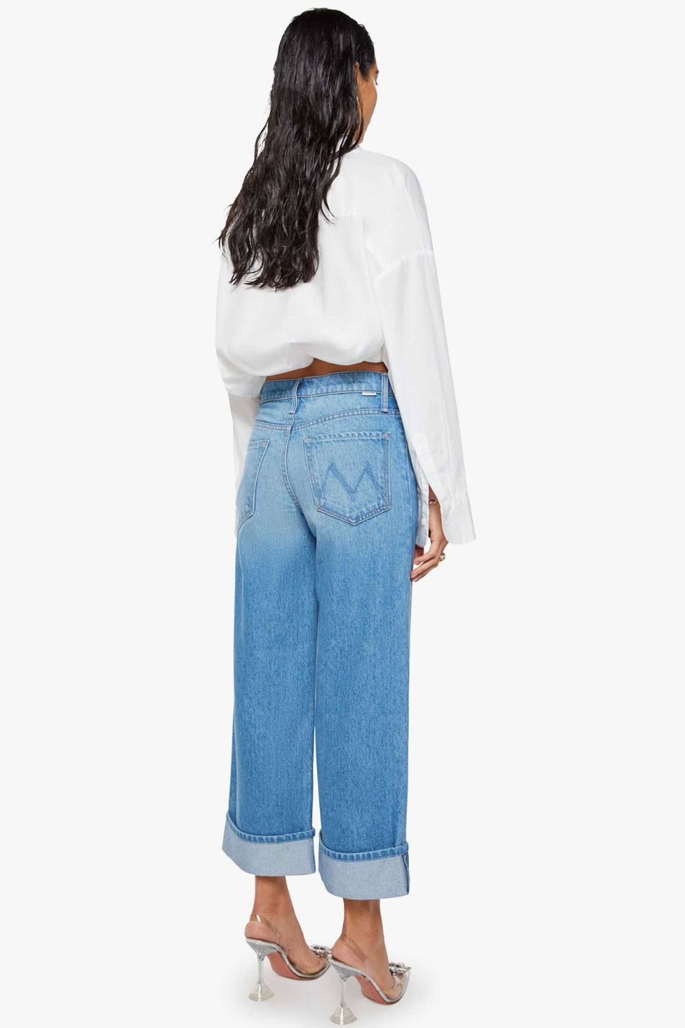 Model wearing Mother Denim The Smoothie Crop Cuff rear view