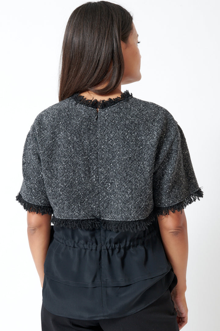 Model wearing Mantu Compact Tweed Fray Layer Shirt rear view