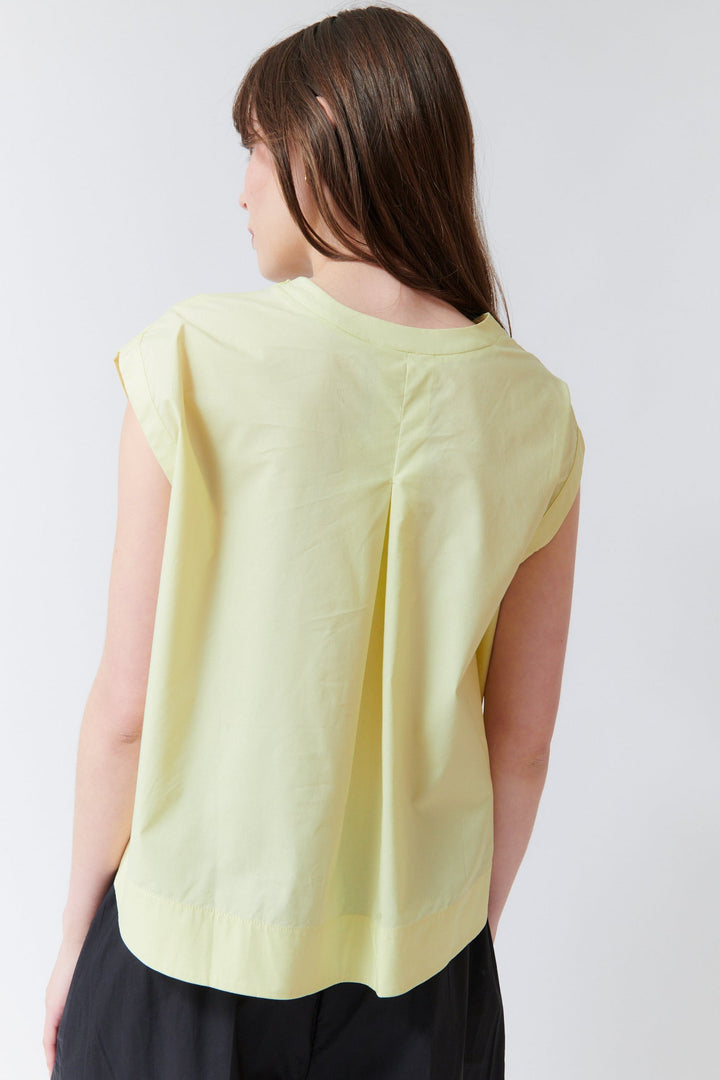 Angela wearing Meimeij Side Split Sleeveless Top rear view