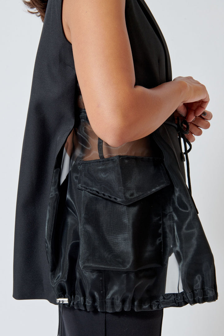 Model wearing Meimeij Ali Gilet side view