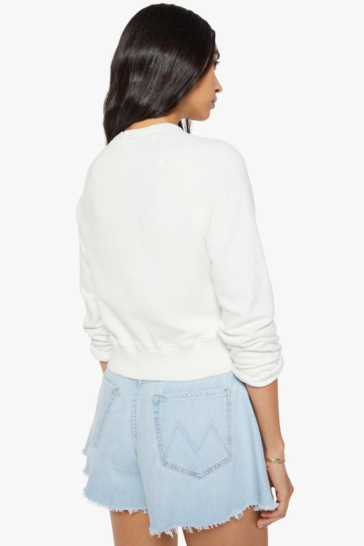 Model wearing Mother Denim The Itty Concert rear view