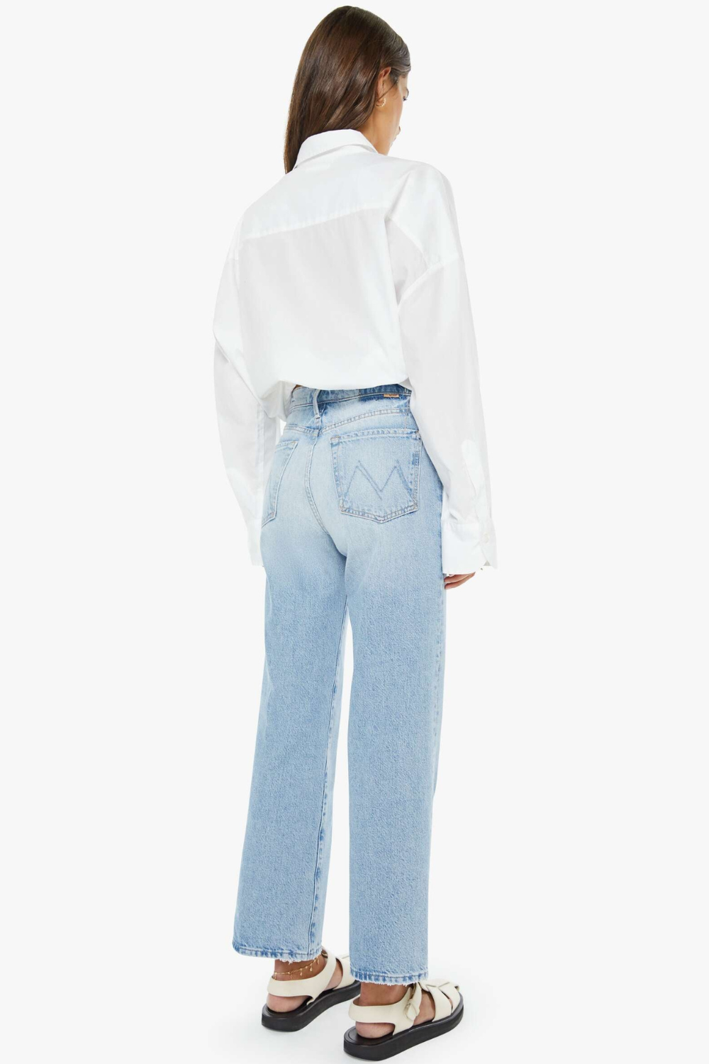 Model wearing Mother Denim The Rambler Zip Flood rear view