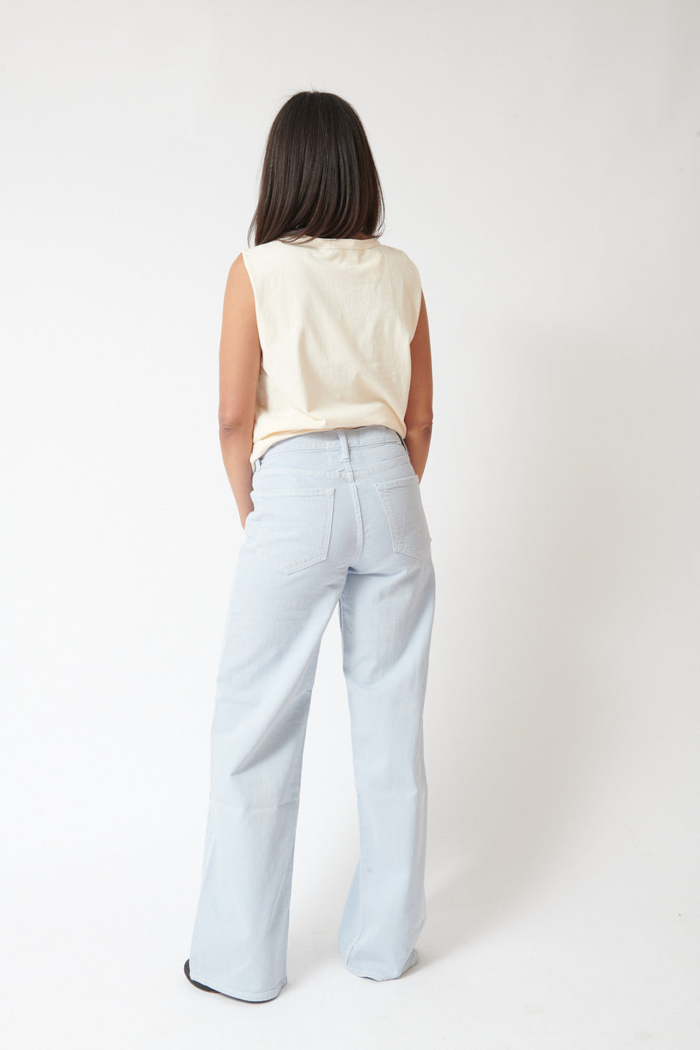 Amanda wearing Mother Denim The Rerun Zip Sneak rear view