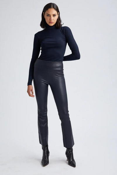 SPRWMN Leather Ankle Flare Legging modeled from the front
