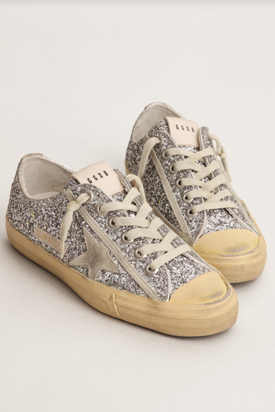 Golden Goose V-Star 2 Glitter at a playfull 3/4 front angle