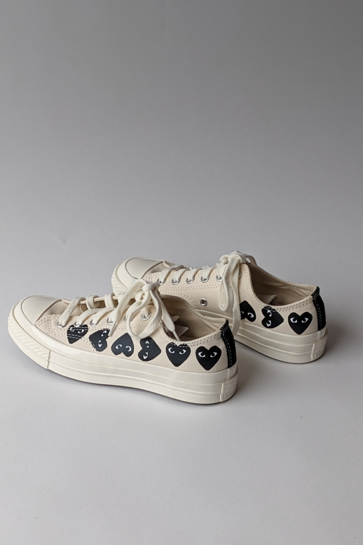 Back, side view of Comme des Garçons PLAY Multi Heart Converse Chuck Taylor Low Top