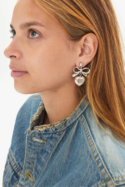 Clare V. Heart Drop Earring in a model's ear
