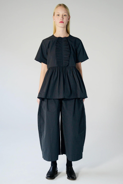 Fabiana Pigna Farao Blouse w/ Hand Pleated Center And Gathered Peplum modeled from the front