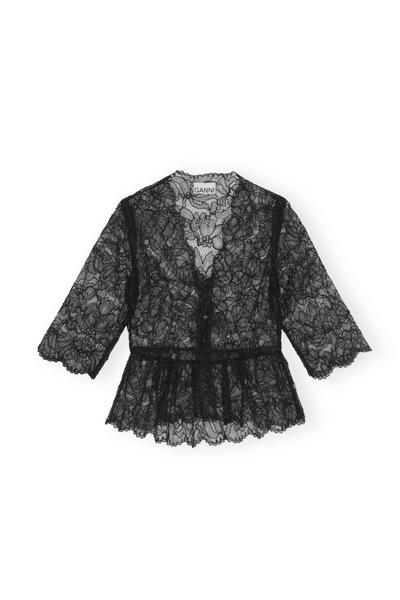 Front of Ganni Light Lace V Neck Blouse laid out