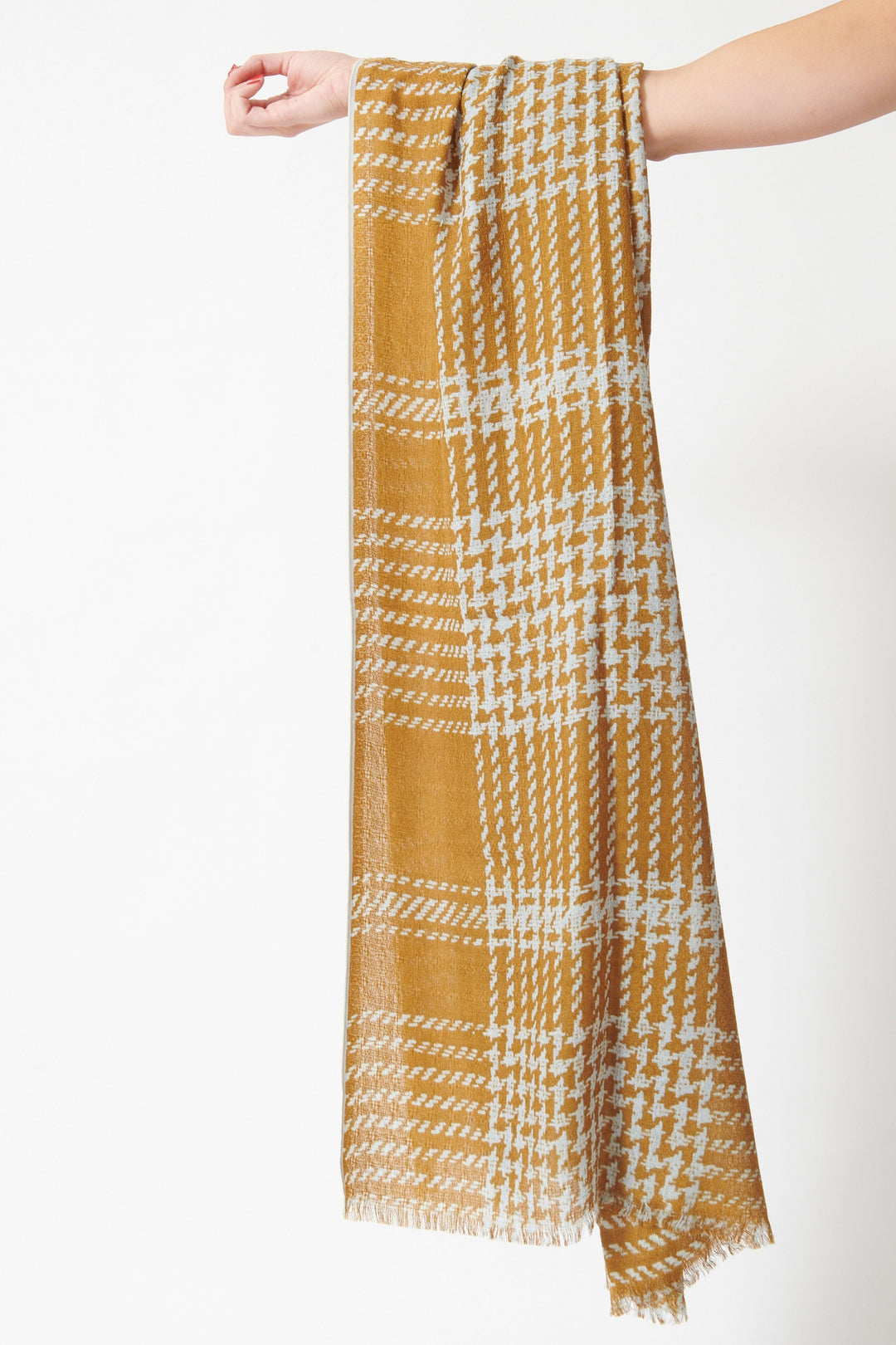 Model holding Épice Tweed Check 1 Shawl front view