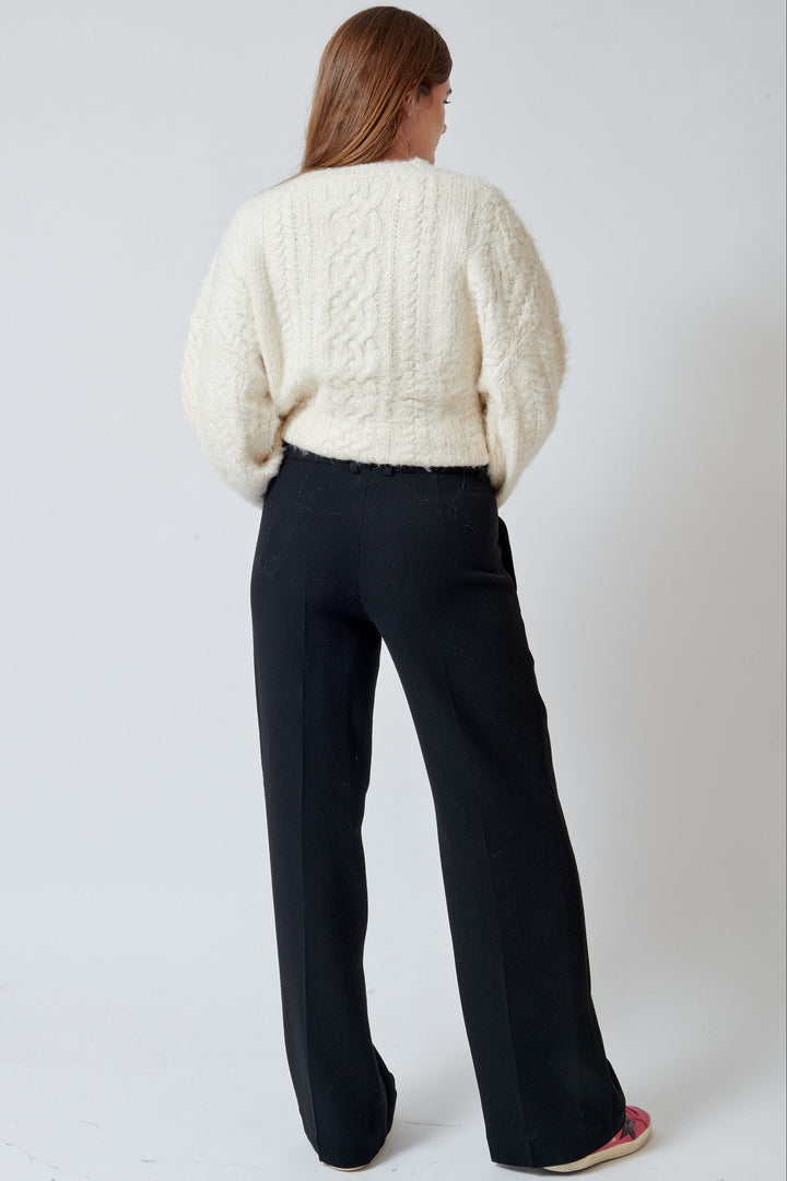 Model wearing Odeeh Heavy Georgette Pants rear view