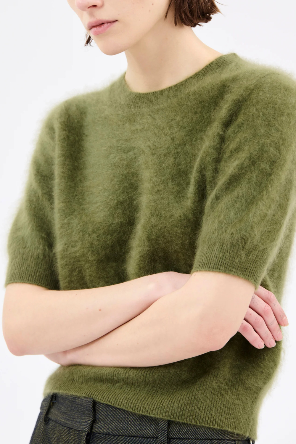 Model wearing Odeeh Brushed Cashmere Mid Sleeve Sweater Moss front/detail view