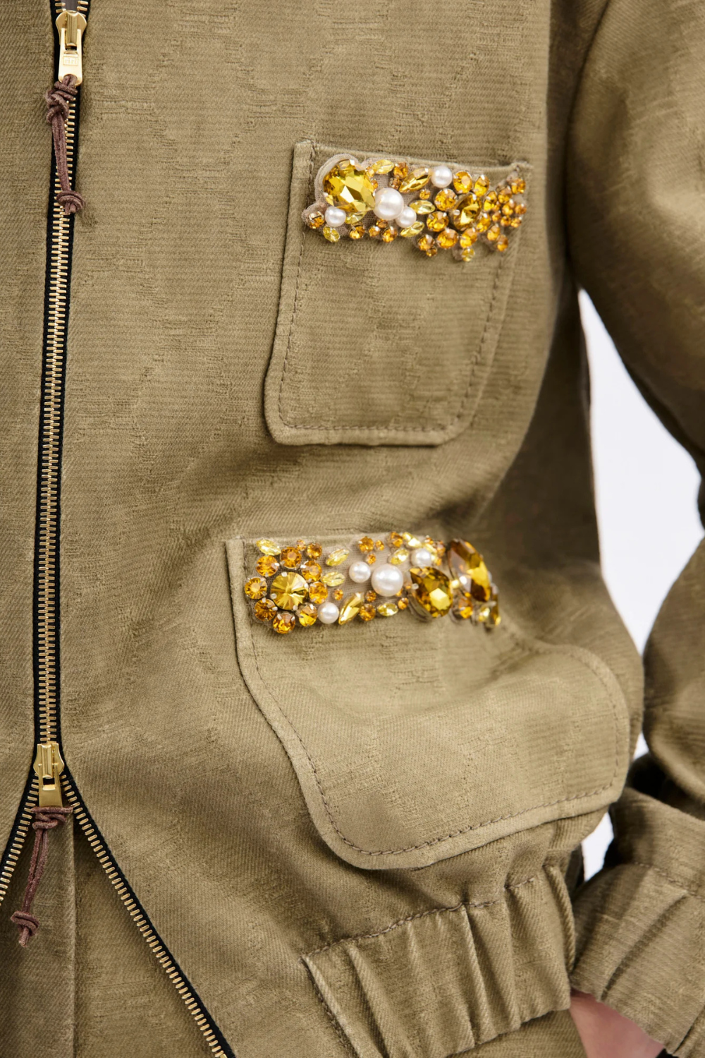 Model wearing Odeeh Cotton Damask Bejeweled Zip Jacket detail view