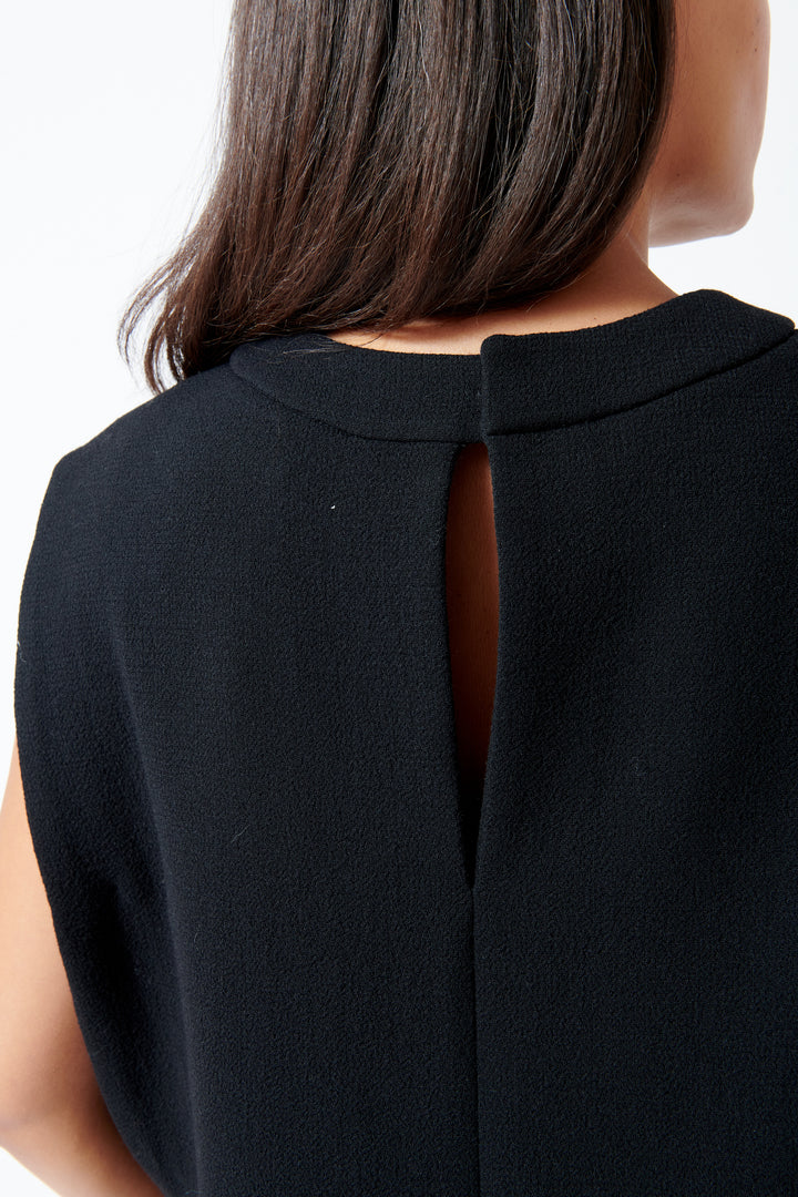 Model wearing Odeeh Heavy Georgette Top rear detail view