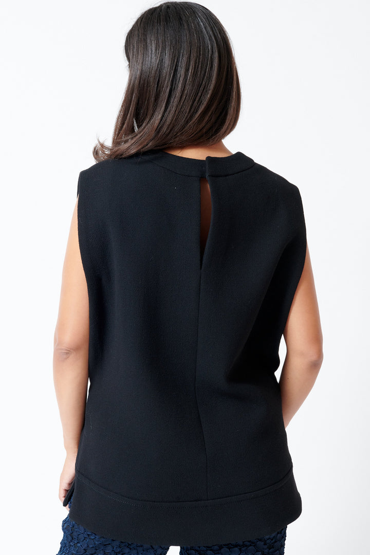 Model wearing Odeeh Heavy Georgette Top rear view