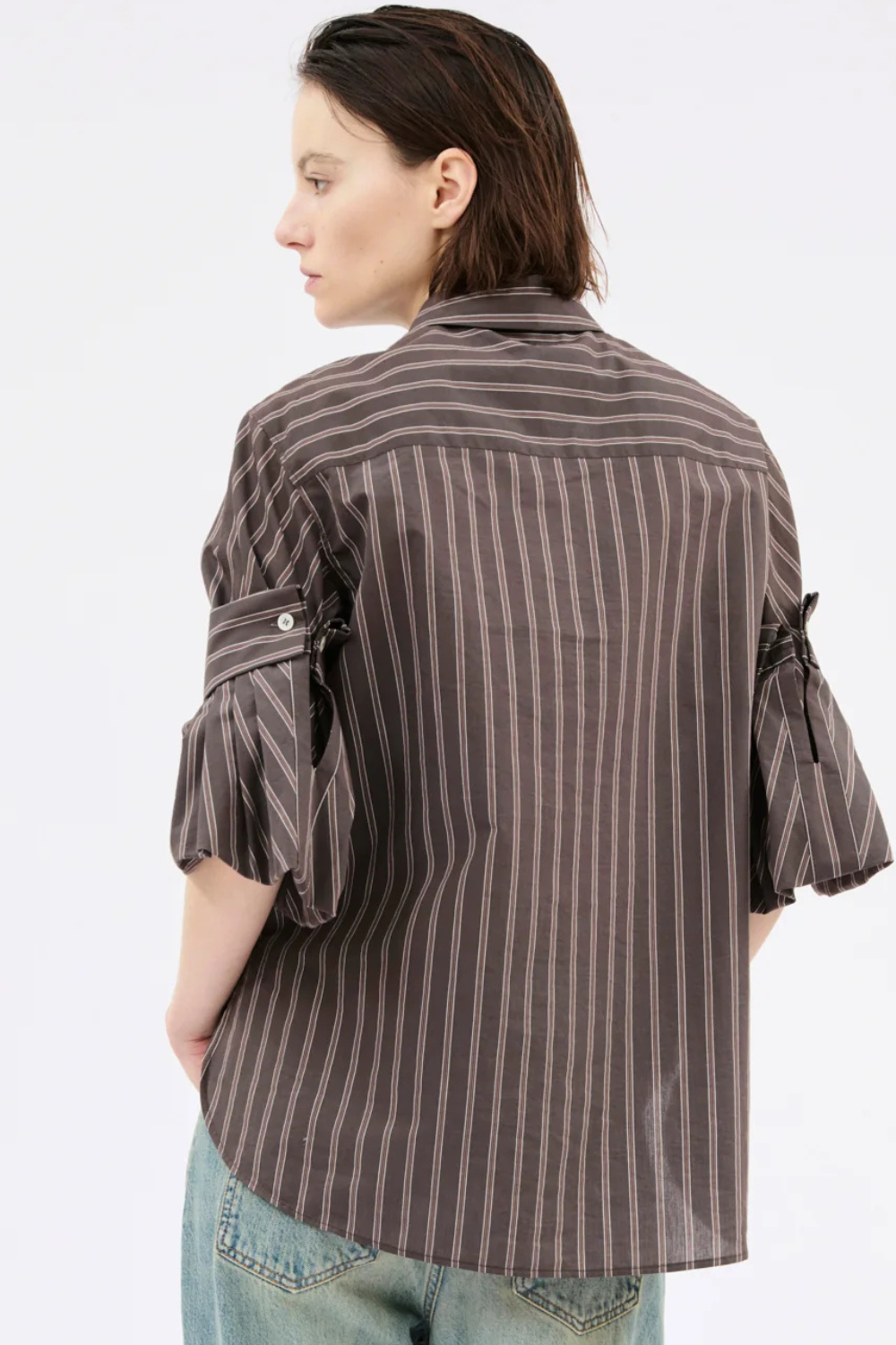 Model wearing Odeeh Mens Stripe Feature Sleeve Shirt Toffee rear view