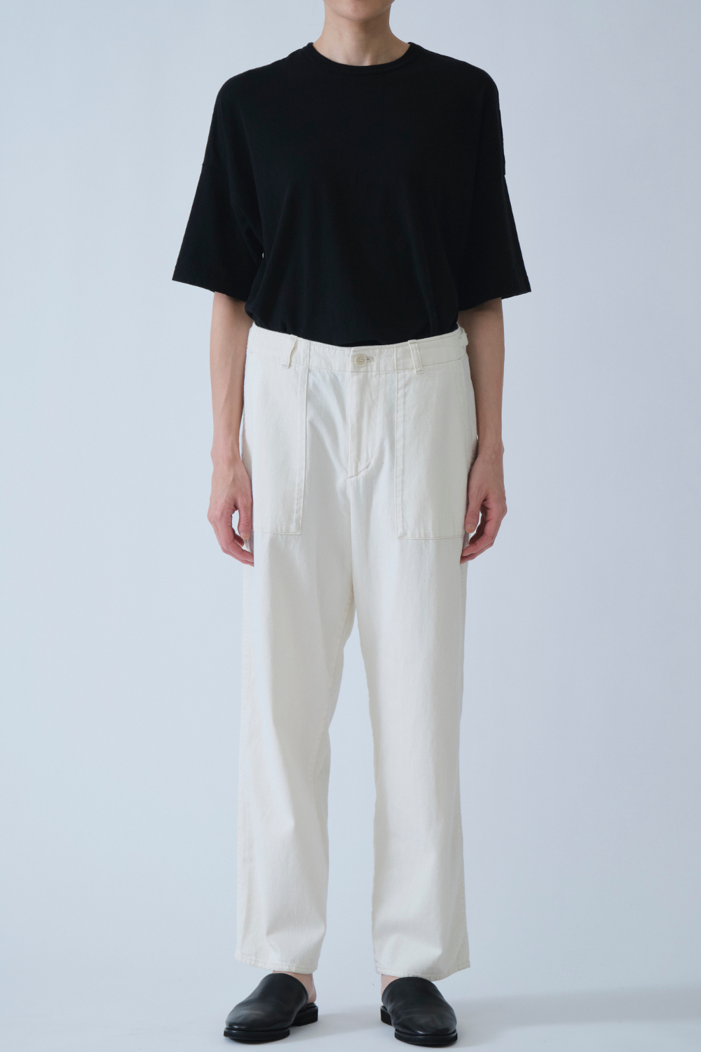 Model wearing Pas de Calais 8oz Natural Denim Baker Pants front view